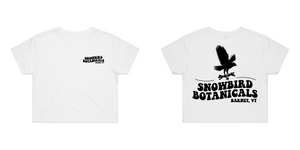 White Crop Top with a Groovy font print on the left chest "Snowbird Botanicals Barnet, VT" and a bigger version on the back with a snowbird added above.
